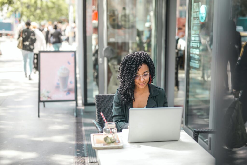 Business owner working on a laptop away from the office